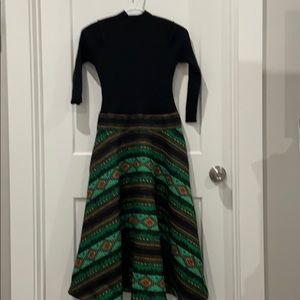 Green and black knit dress